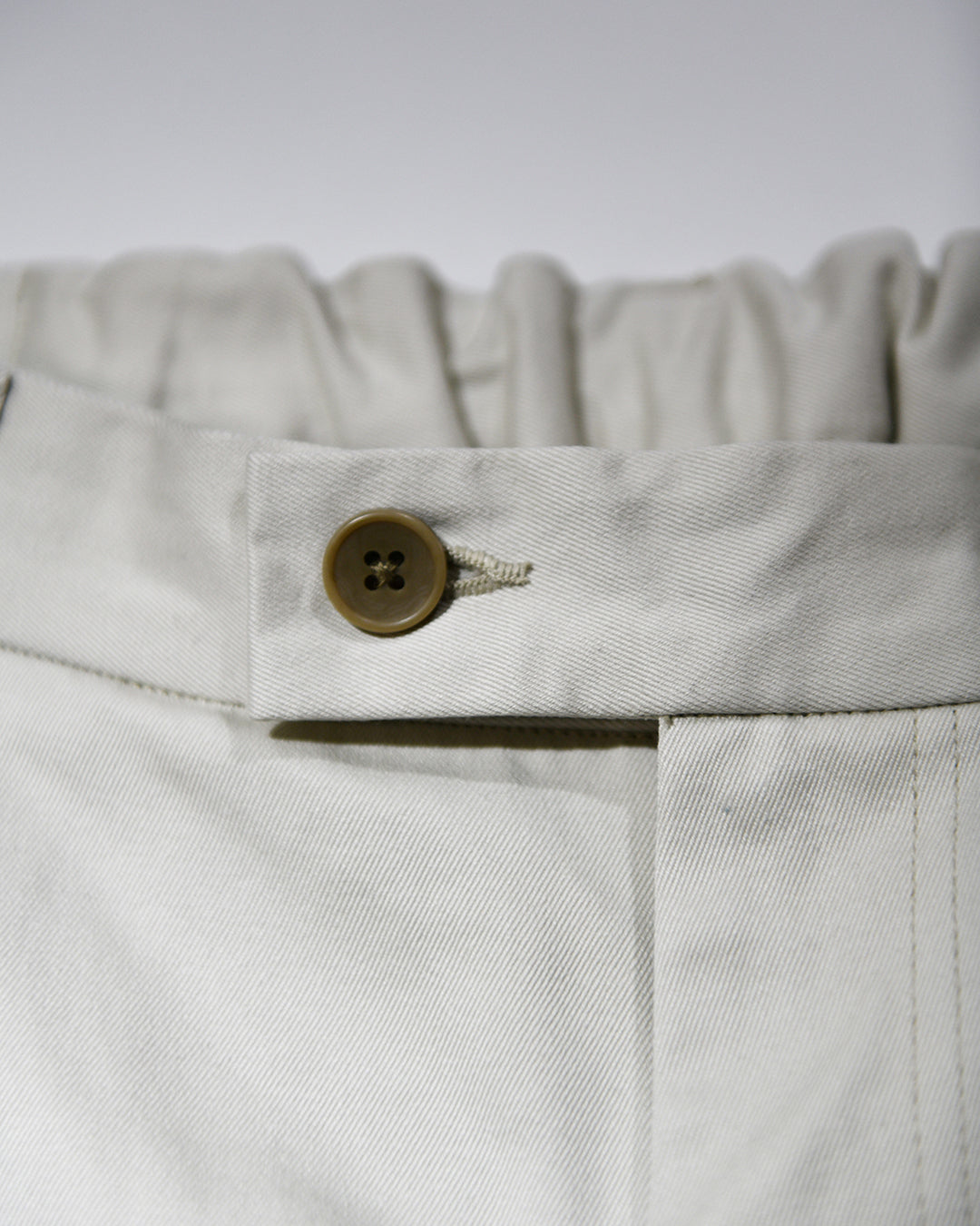 OUTSIDE PLEATED TROUSERS