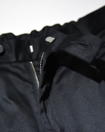 OUTSIDE PLEATED SHORTS
