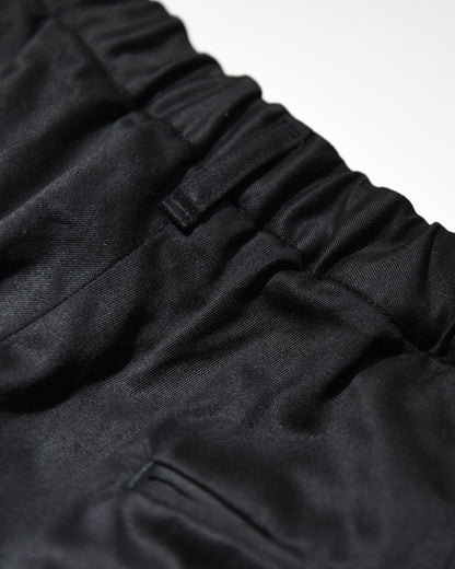 OUTSIDE PLEATED SHORTS