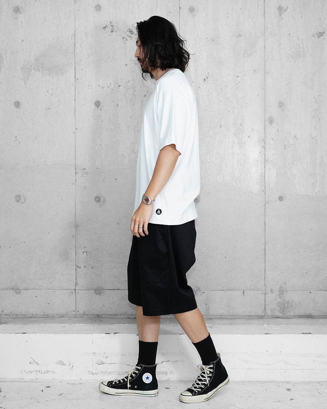 OUTSIDE PLEATED SHORTS