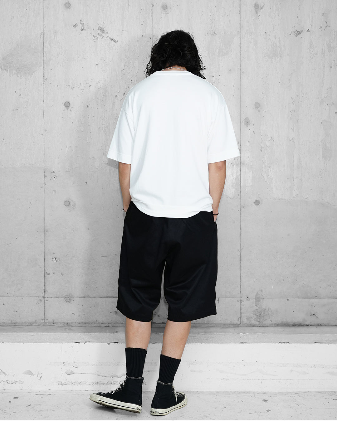 OUTSIDE PLEATED SHORTS